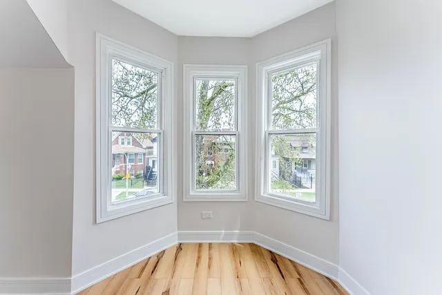 an empty room with windows