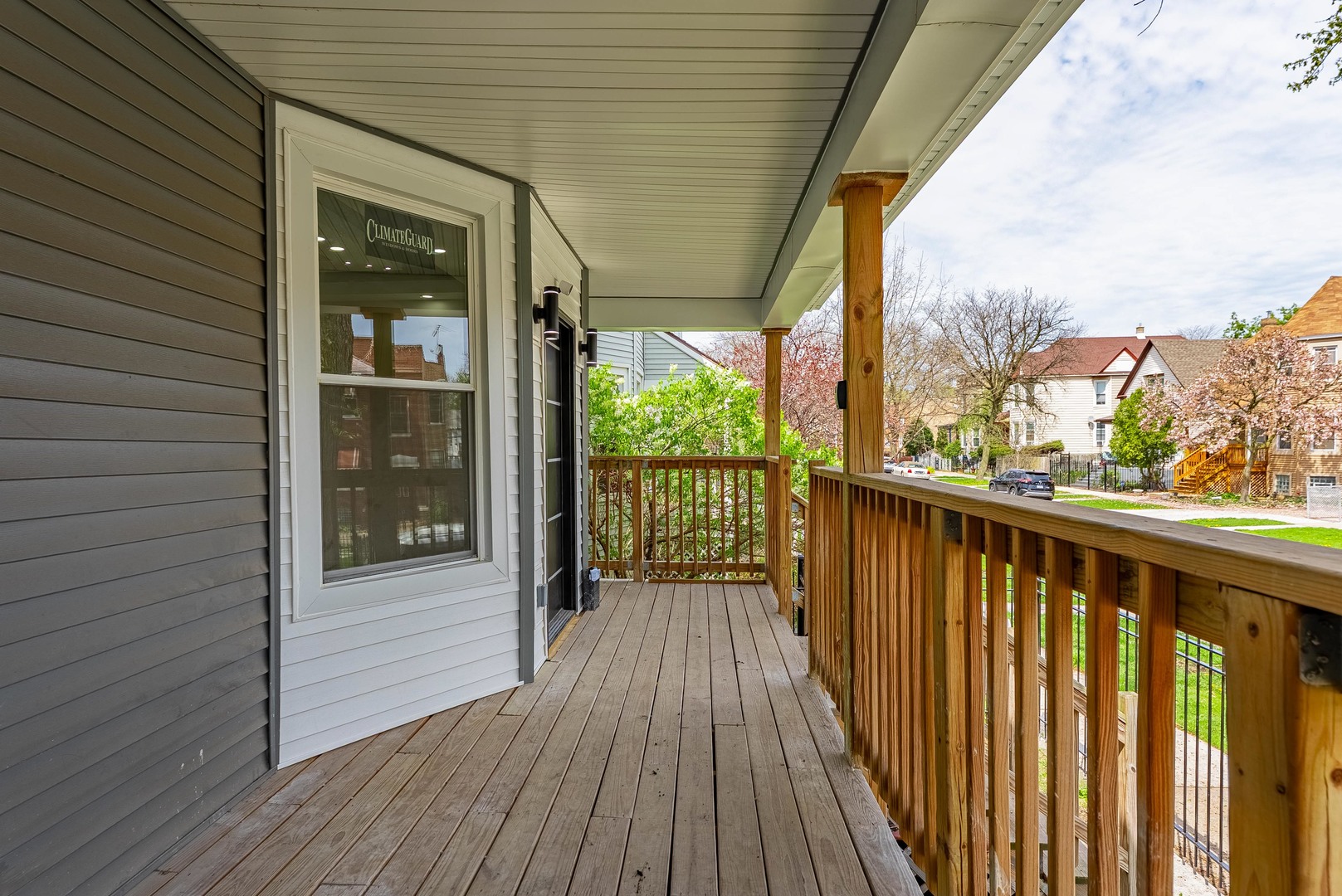 822 North Lockwood Avenue Chicago, IL 60651 - Photo 3 of 63 a view of a balcony with wooden floor