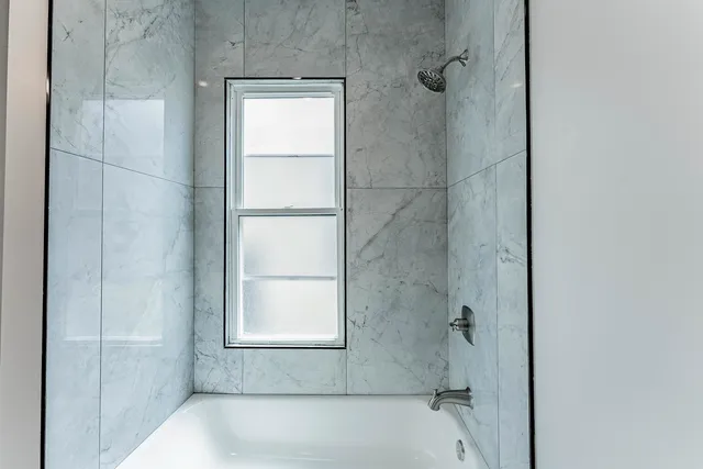 a view of a hallway with staircase