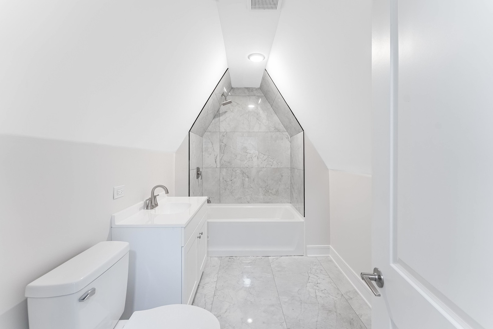 822 North Lockwood Avenue Chicago, IL 60651 - Photo 50 of 63 a bathroom with a sink a toilet and bathtub