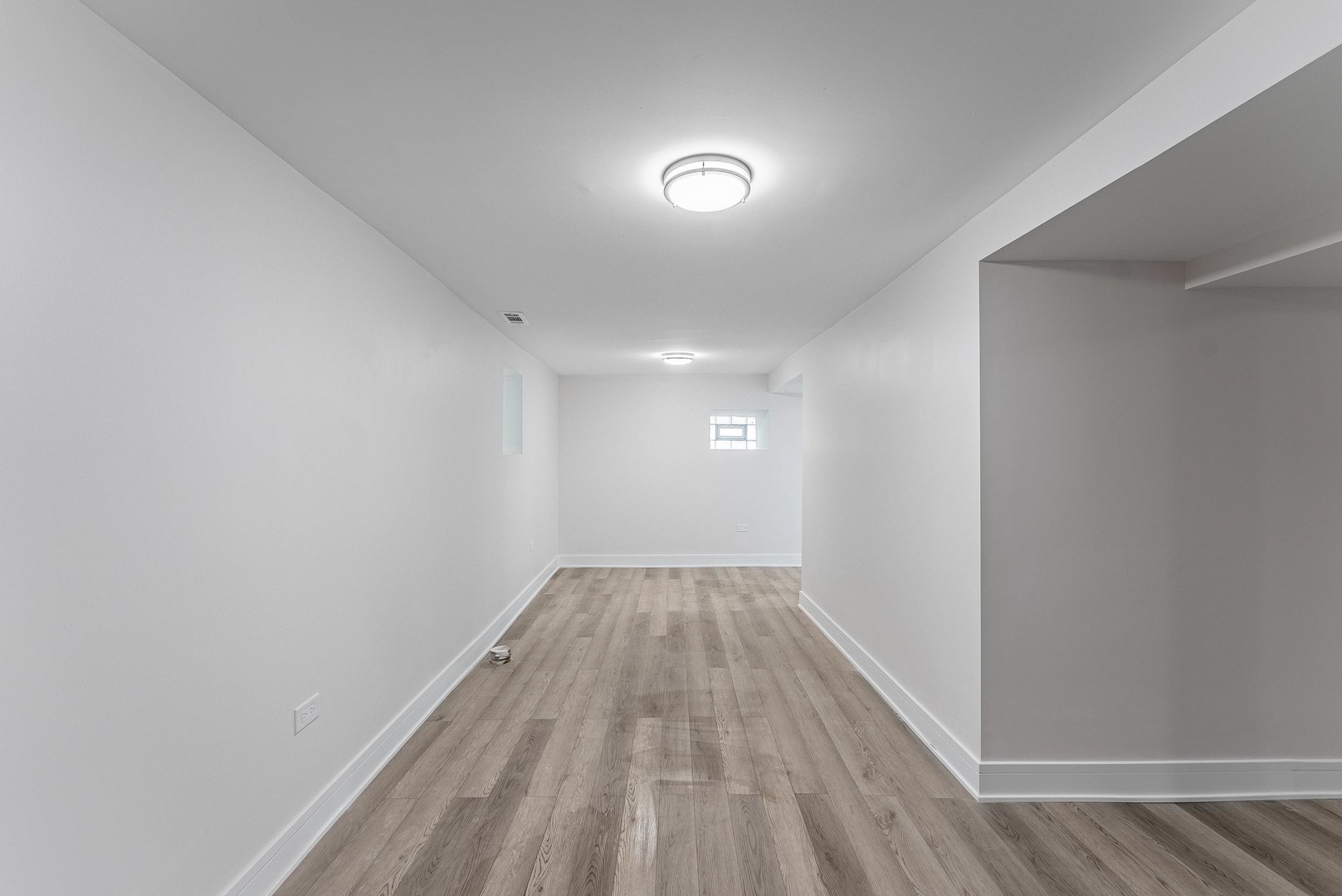 822 North Lockwood Avenue Chicago, IL 60651 - Photo 54 of 63 a view of wooden floor in a room