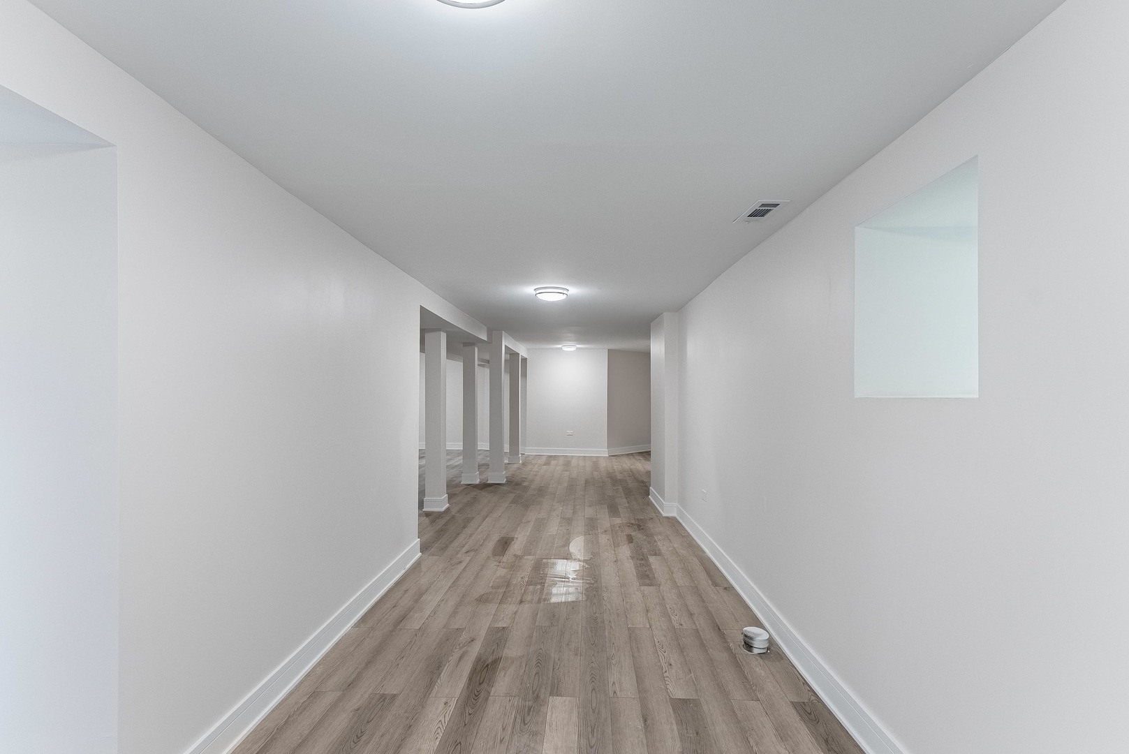 822 North Lockwood Avenue Chicago, IL 60651 - Photo 55 of 63 a view of hallway with wooden floor