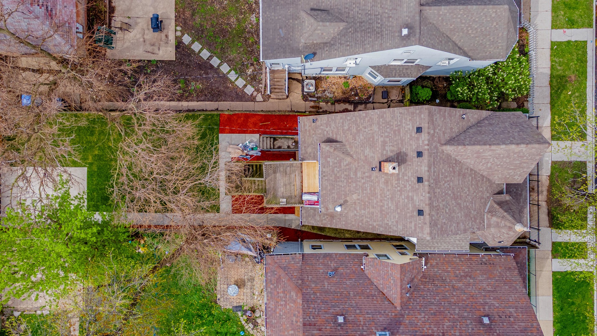 822 North Lockwood Avenue Chicago, IL 60651 - Photo 61 of 63 an aerial view of residential houses with outdoor space and parking