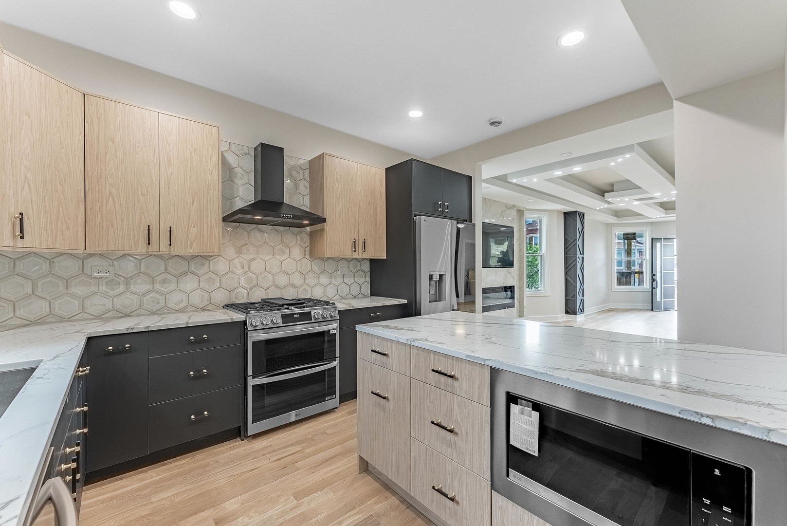 822 North Lockwood Avenue Chicago, IL 60651 - Photo 7 of 63 a kitchen with stainless steel appliances granite countertop a sink stove and oven