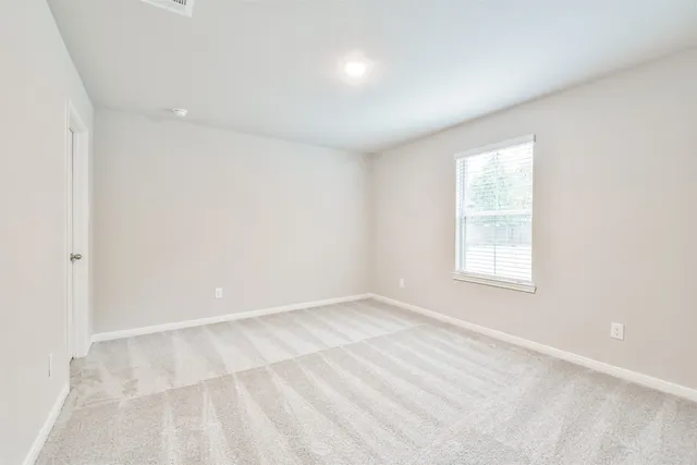 an empty room with a window