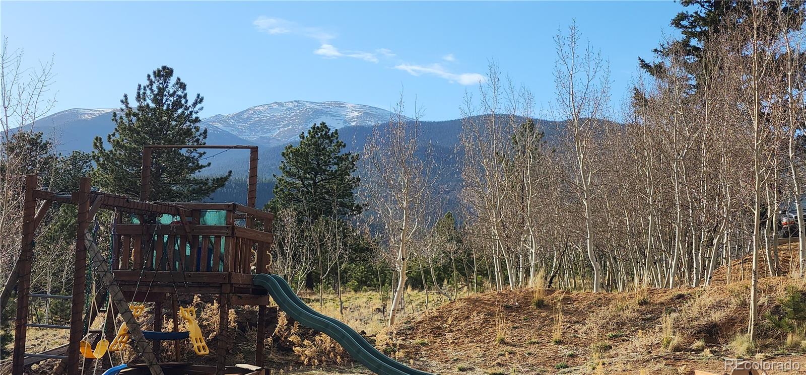 388 Clark Road Bailey, CO 80421 - Photo 40 of 50 a view of a balcony with an outdoor space