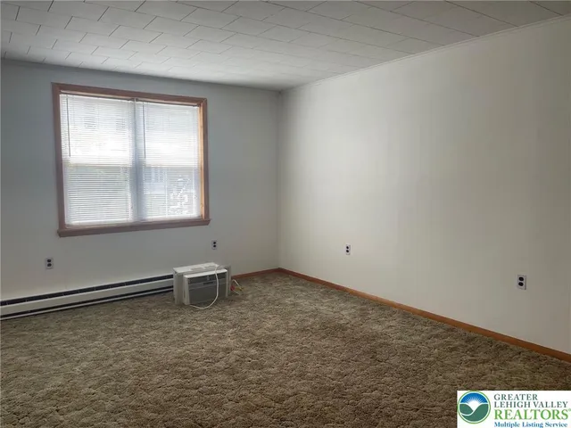 an empty room with a window