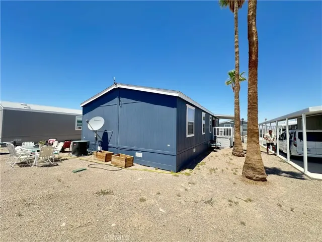 a view of a terrace space with wooden fence