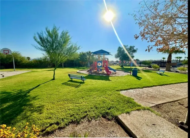 a view of a park with swings