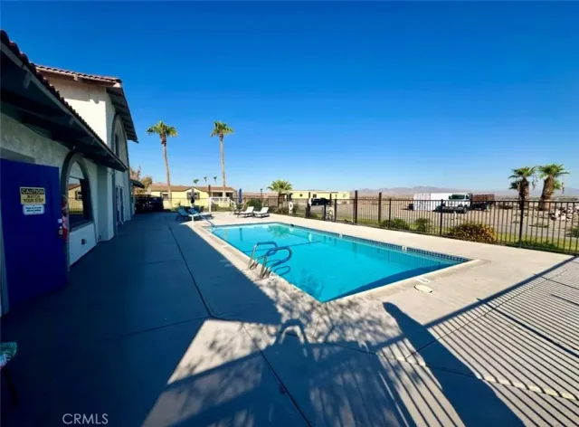 a view of a balcony with chairs