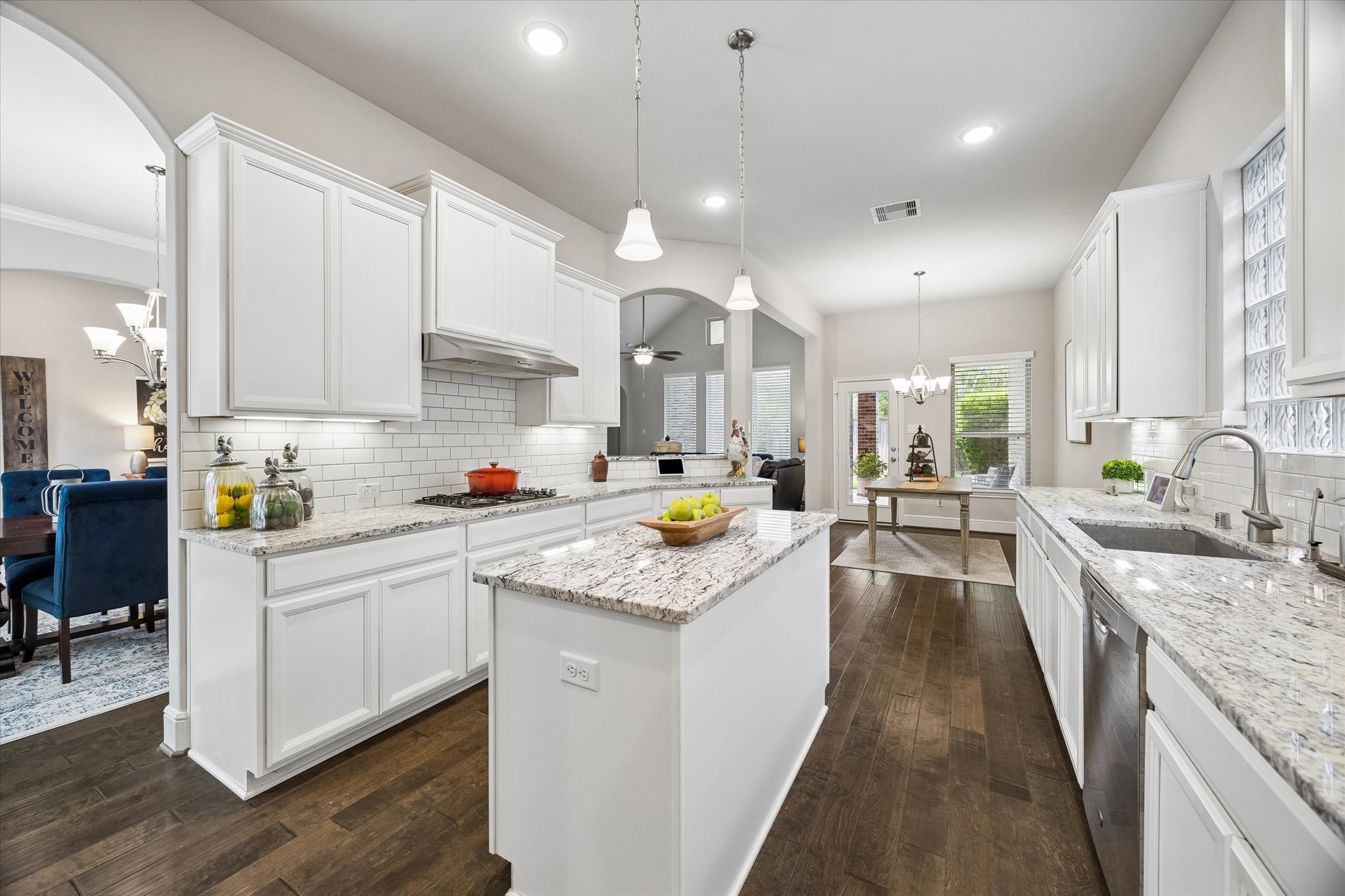 19 Peace Tree Way Tomball, TX 77375 - Photo 20 of 36 Spacious kitchen featuring an expansive island and generous countertop prep space, perfect for cooking and entertaining.