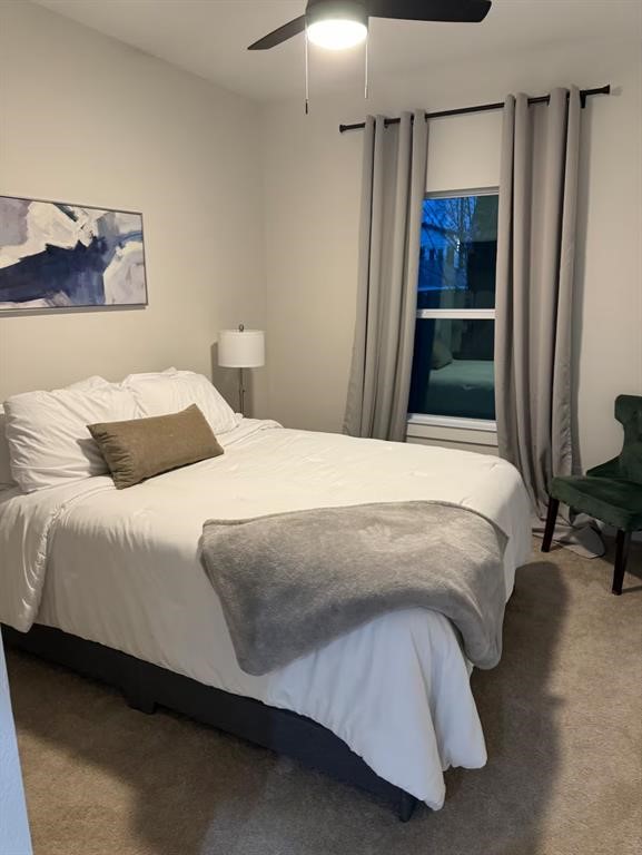 3610 Dreyfus Street, Unit A Houston, TX 77021 - Photo 20 of 20 a bedroom with a bed and a table