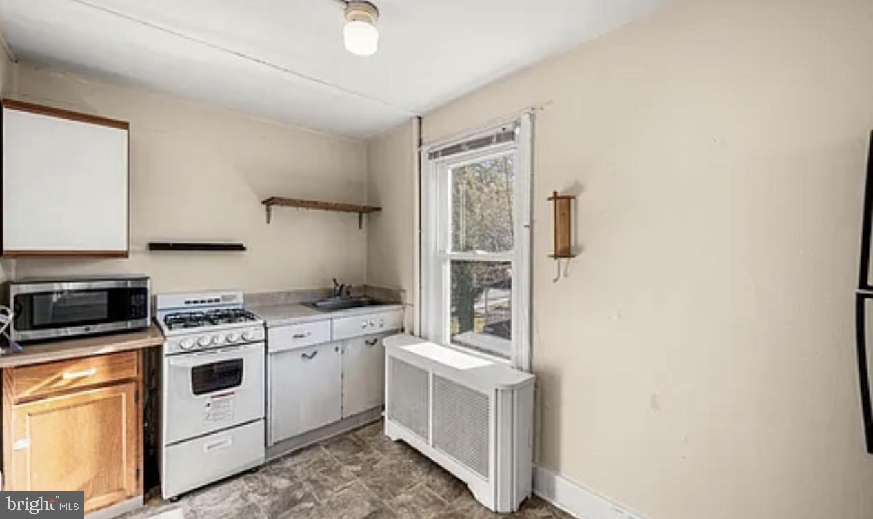 106 North Valley Road, Unit 2 Paoli, PA 19301 - Photo 10 of 17 Bright and functional kitchen space.