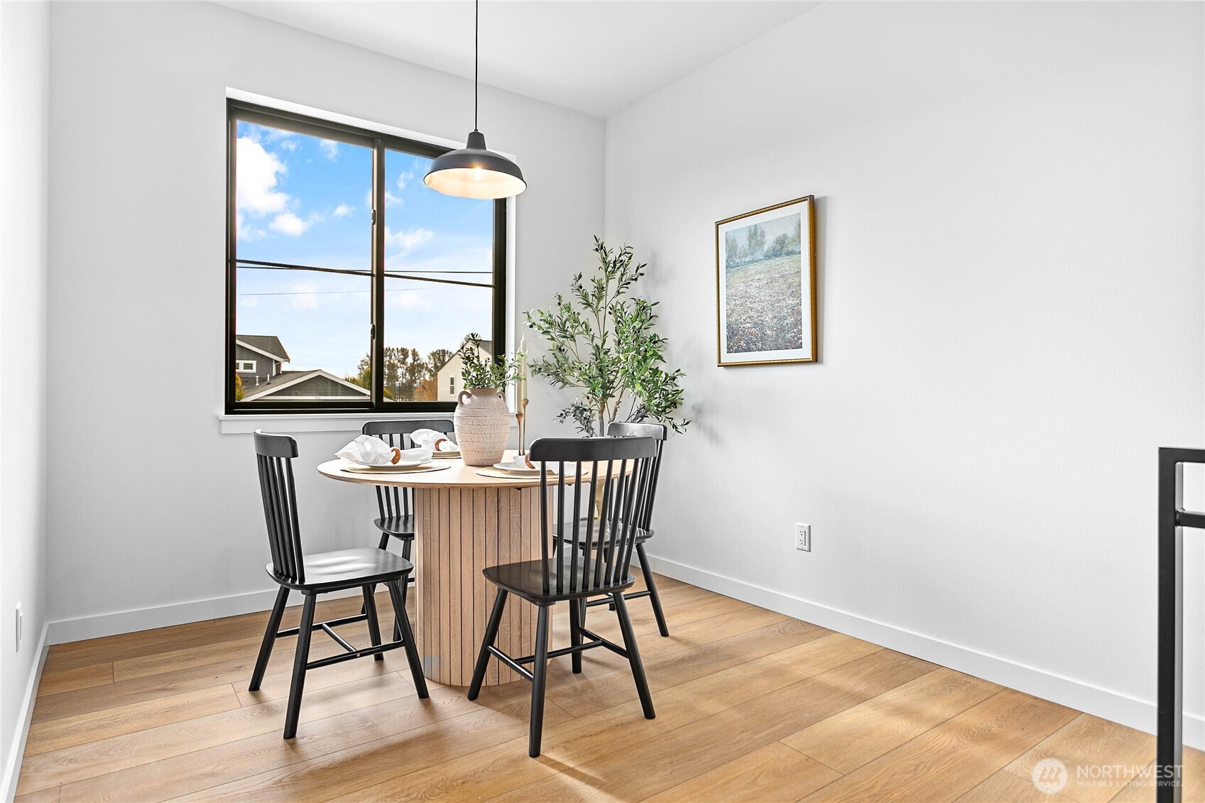 706 Judson Street, Unit A Lynden, WA 98264 - Photo 18 of 35 a dining room with furniture window wooden floor