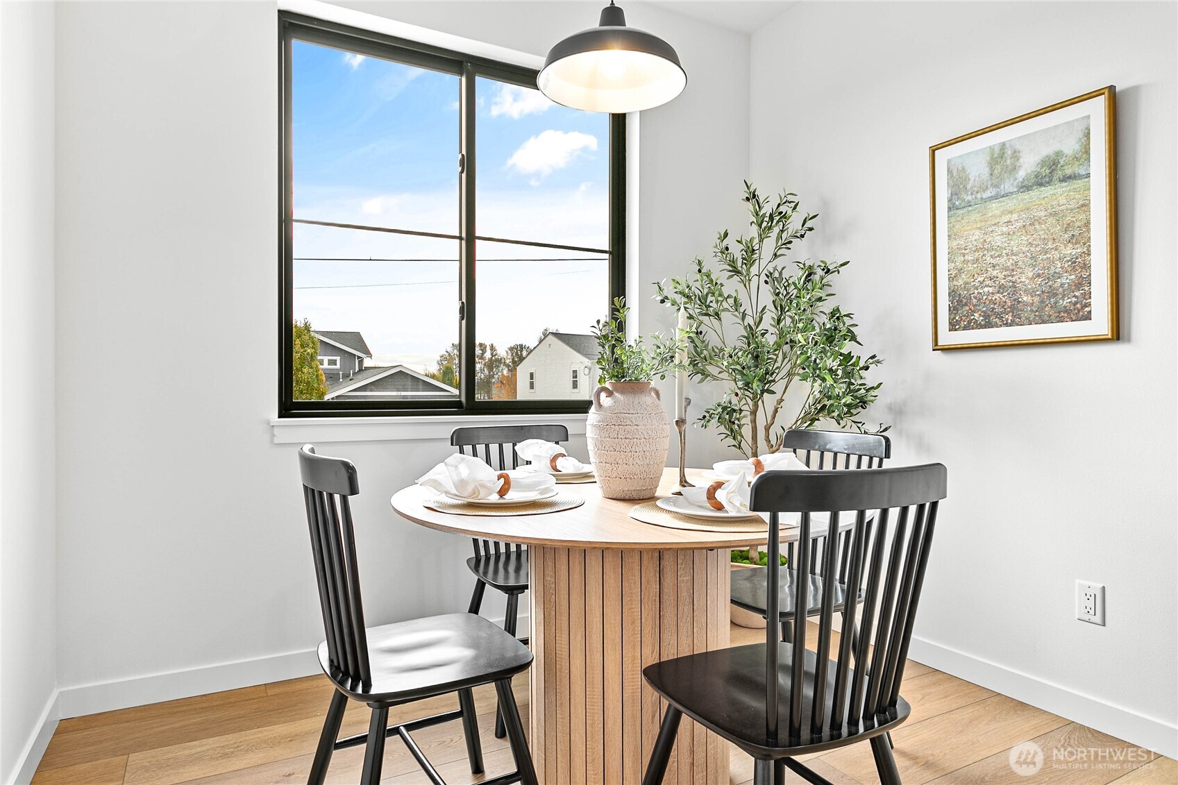 706 Judson Street, Unit A Lynden, WA 98264 - Photo 19 of 35 a view of a dining room with furniture window and outside view