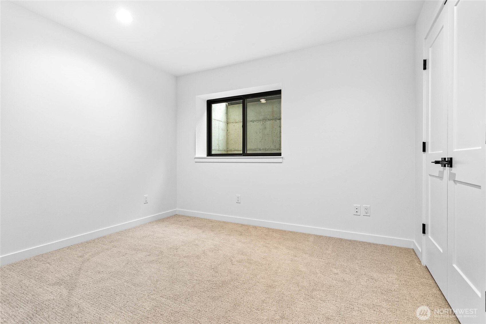 706 Judson Street, Unit A Lynden, WA 98264 - Photo 21 of 35 a view of an empty room with a window