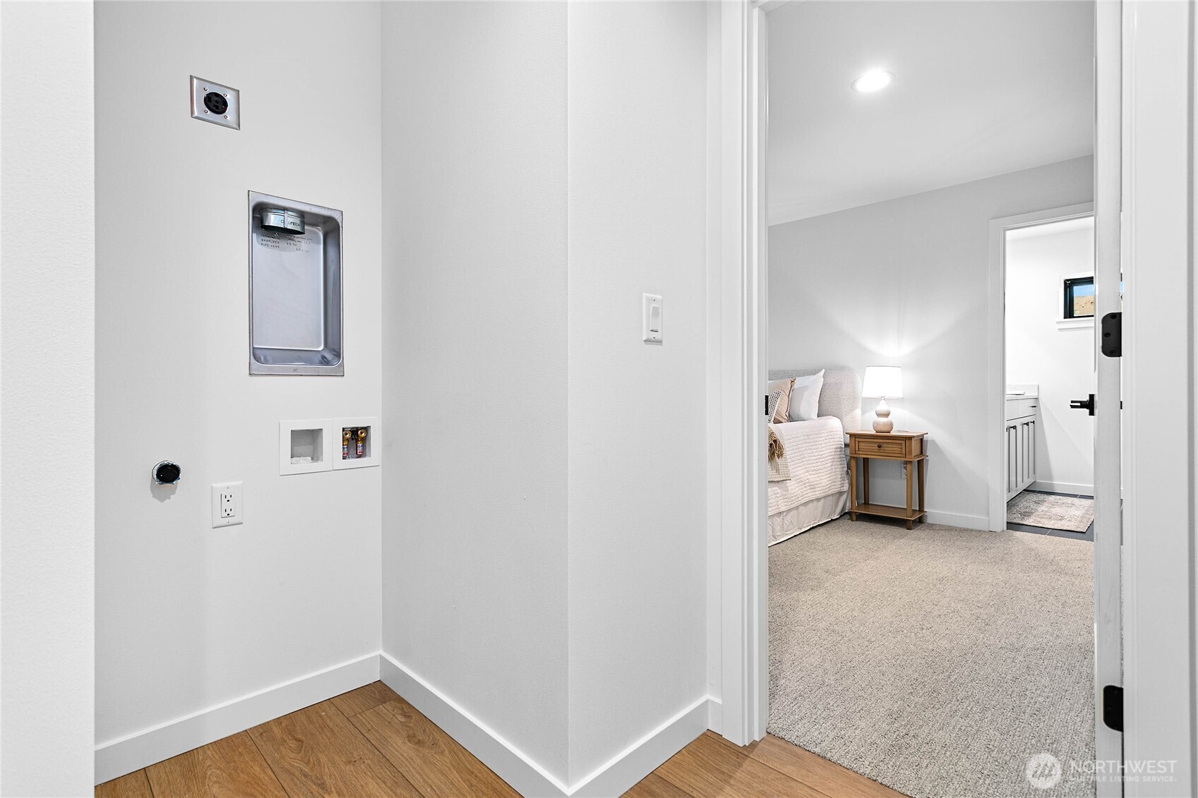 706 Judson Street, Unit A Lynden, WA 98264 - Photo 24 of 35 a view of a room with wooden floor and bathroom