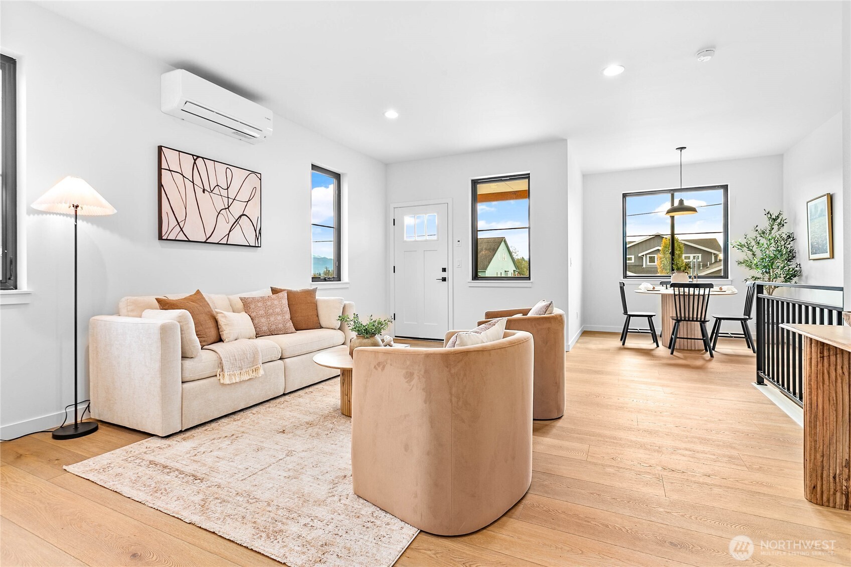 706 Judson Street, Unit A Lynden, WA 98264 - Photo 8 of 35 a living room with couches and painting on the wall