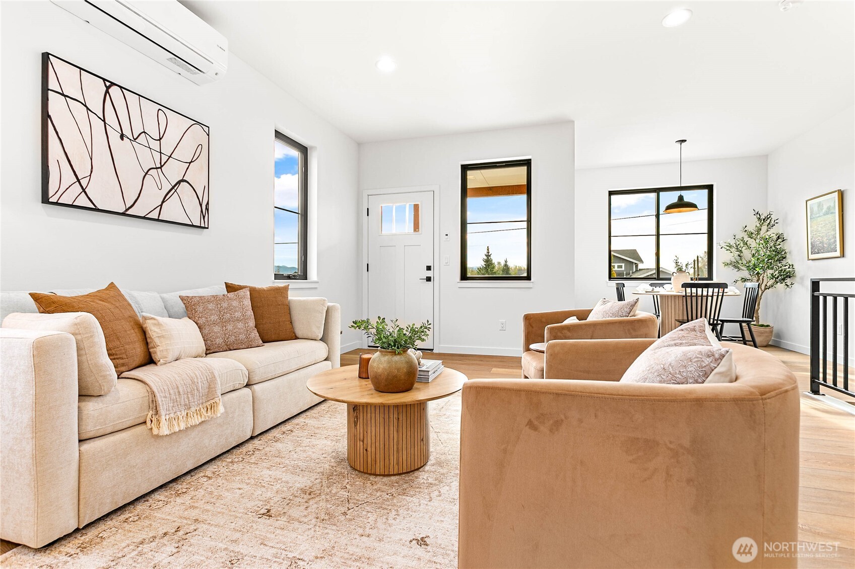 706 Judson Street, Unit A Lynden, WA 98264 - Photo 9 of 35 a living room with furniture and a potted plant