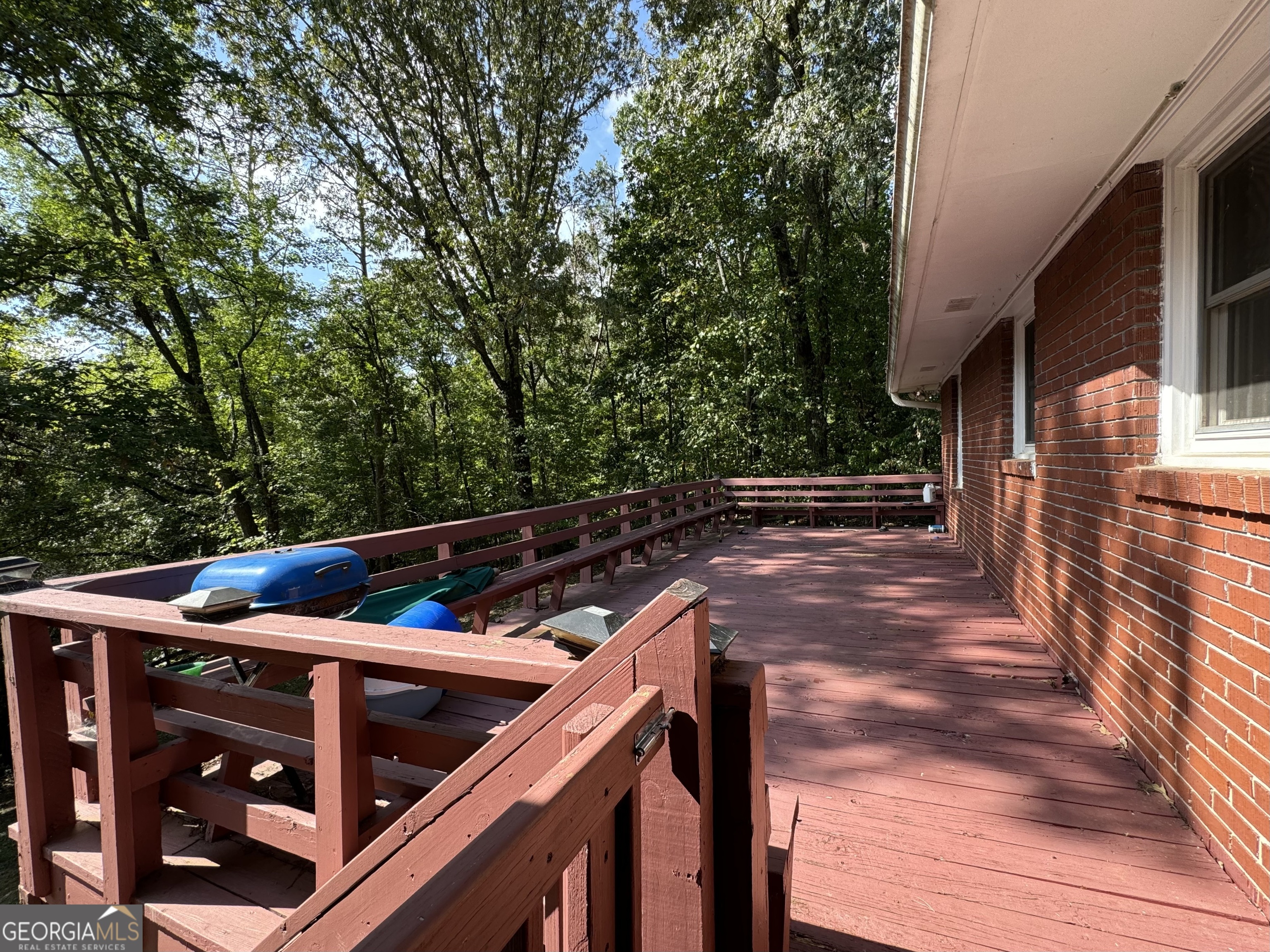 156 Brett Road Cleveland, GA 30528 - Photo 3 of 32 a view of an outdoor space with seating