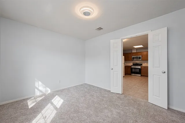 a view of a room & utility room