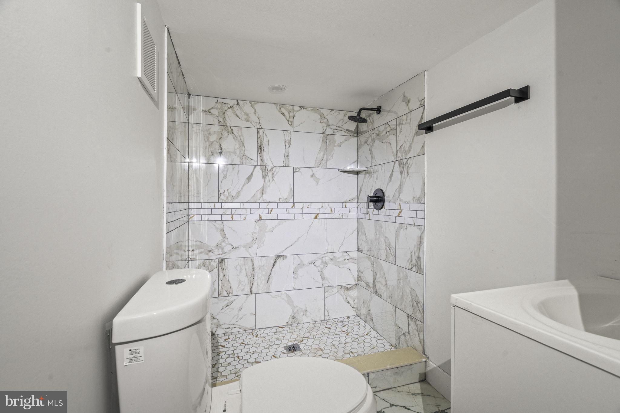 4935 North 8th Street Philadelphia, PA 19120 - Photo 11 of 11 basement bathroom