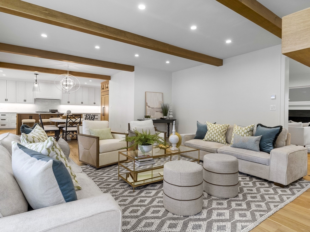 77 Forest Street Wellesley, MA 02481 - Photo 8 of 32 a living room with furniture and a large window