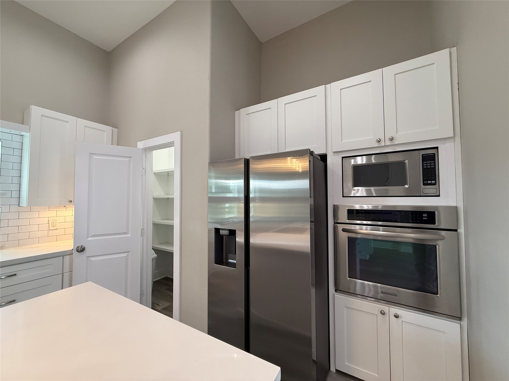 2123 Bidwell Drive Houston, TX 77018 - Photo 11 of 29 a kitchen with a refrigerator sink and microwave