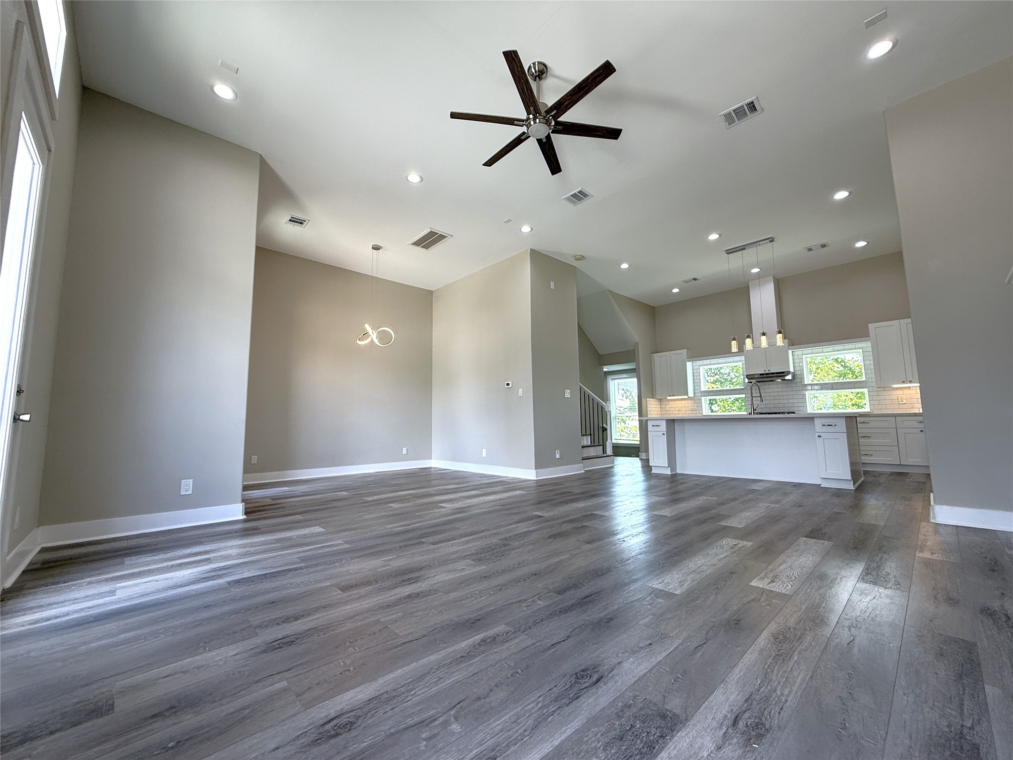 2123 Bidwell Drive Houston, TX 77018 - Photo 13 of 29 a view of empty room with wooden floor and window