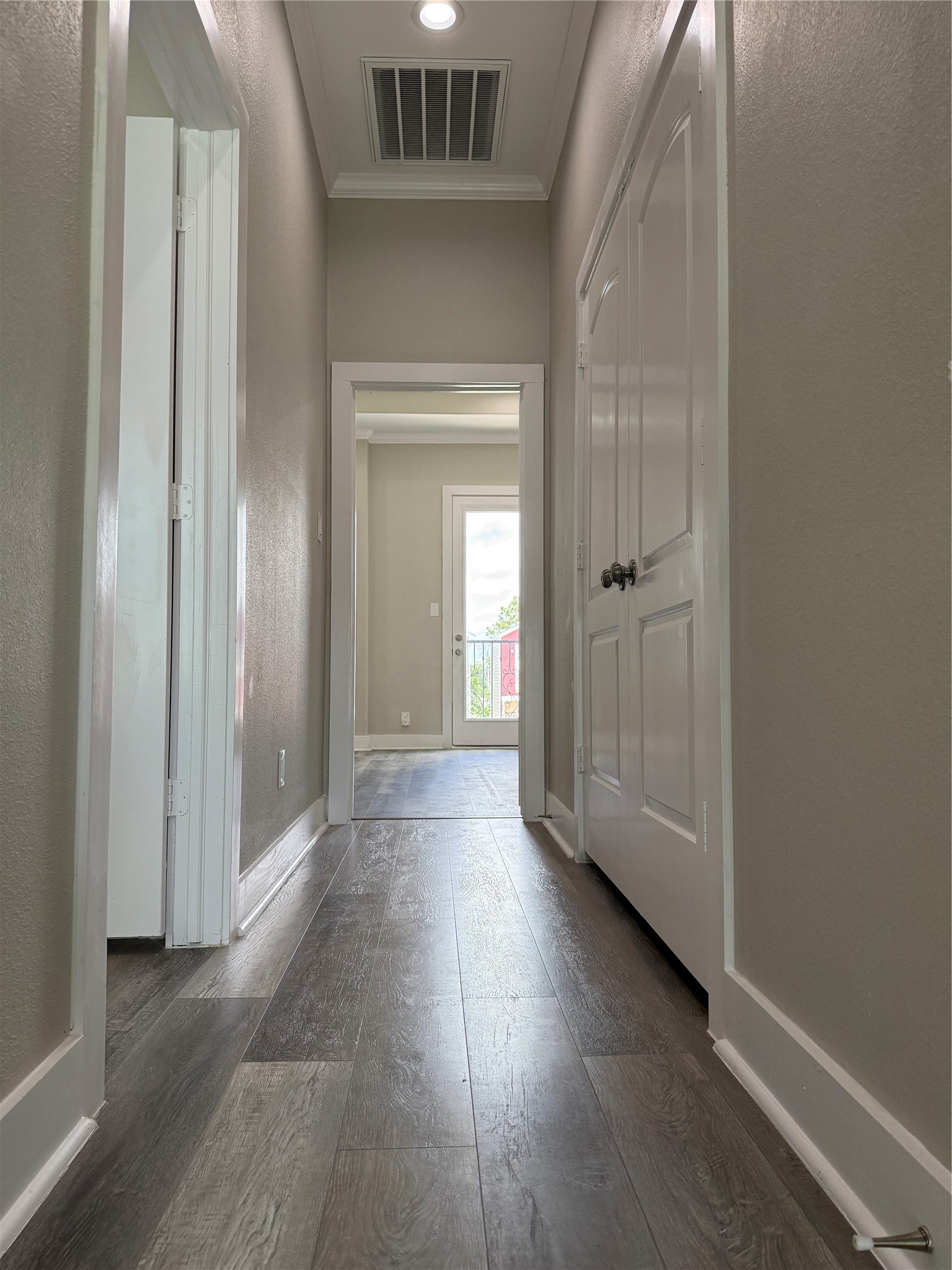 2123 Bidwell Drive Houston, TX 77018 - Photo 19 of 29 a view of a hallway with wooden floor