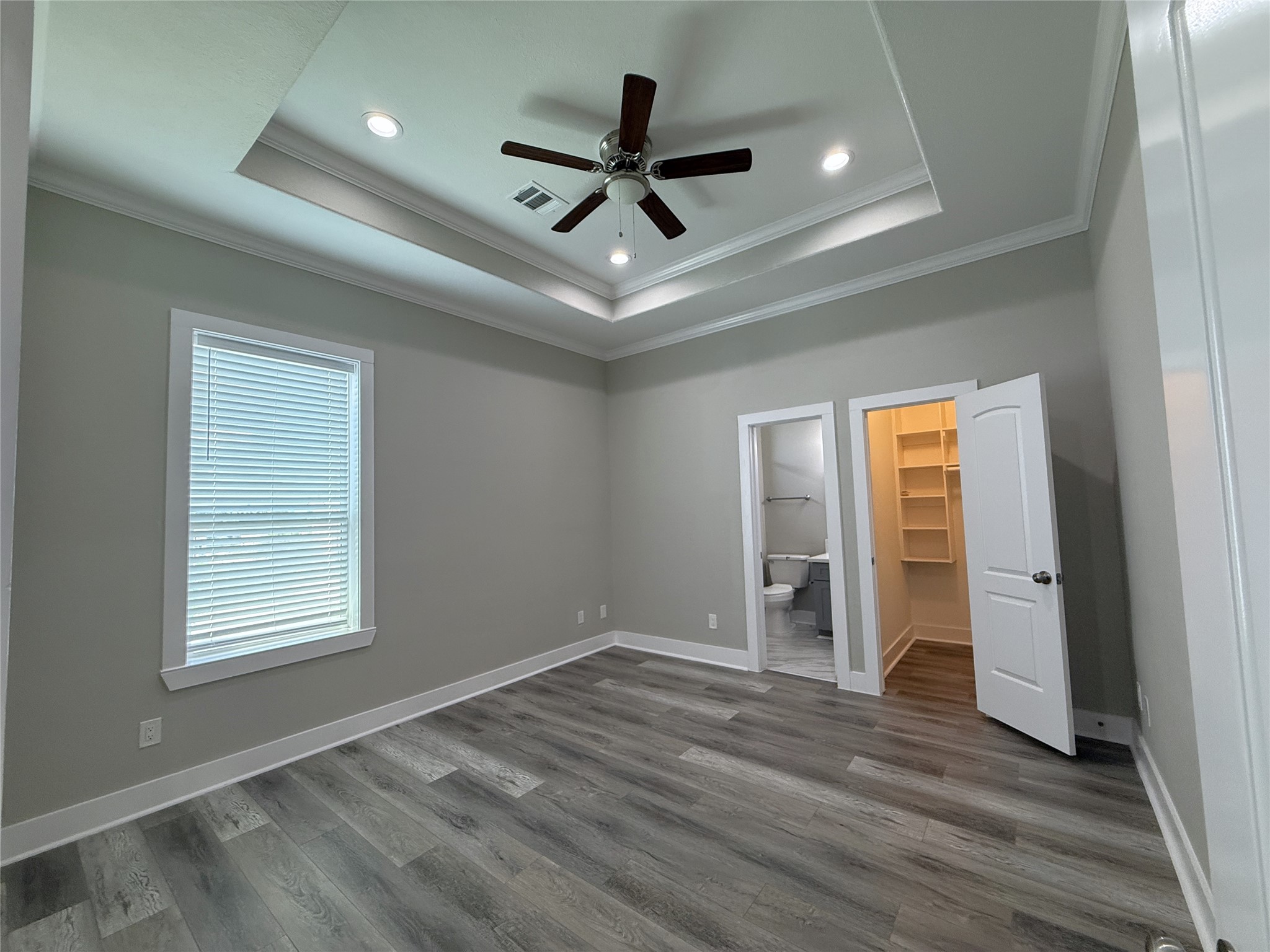 2123 Bidwell Drive Houston, TX 77018 - Photo 20 of 29 a view of an empty room with wooden floor and a window