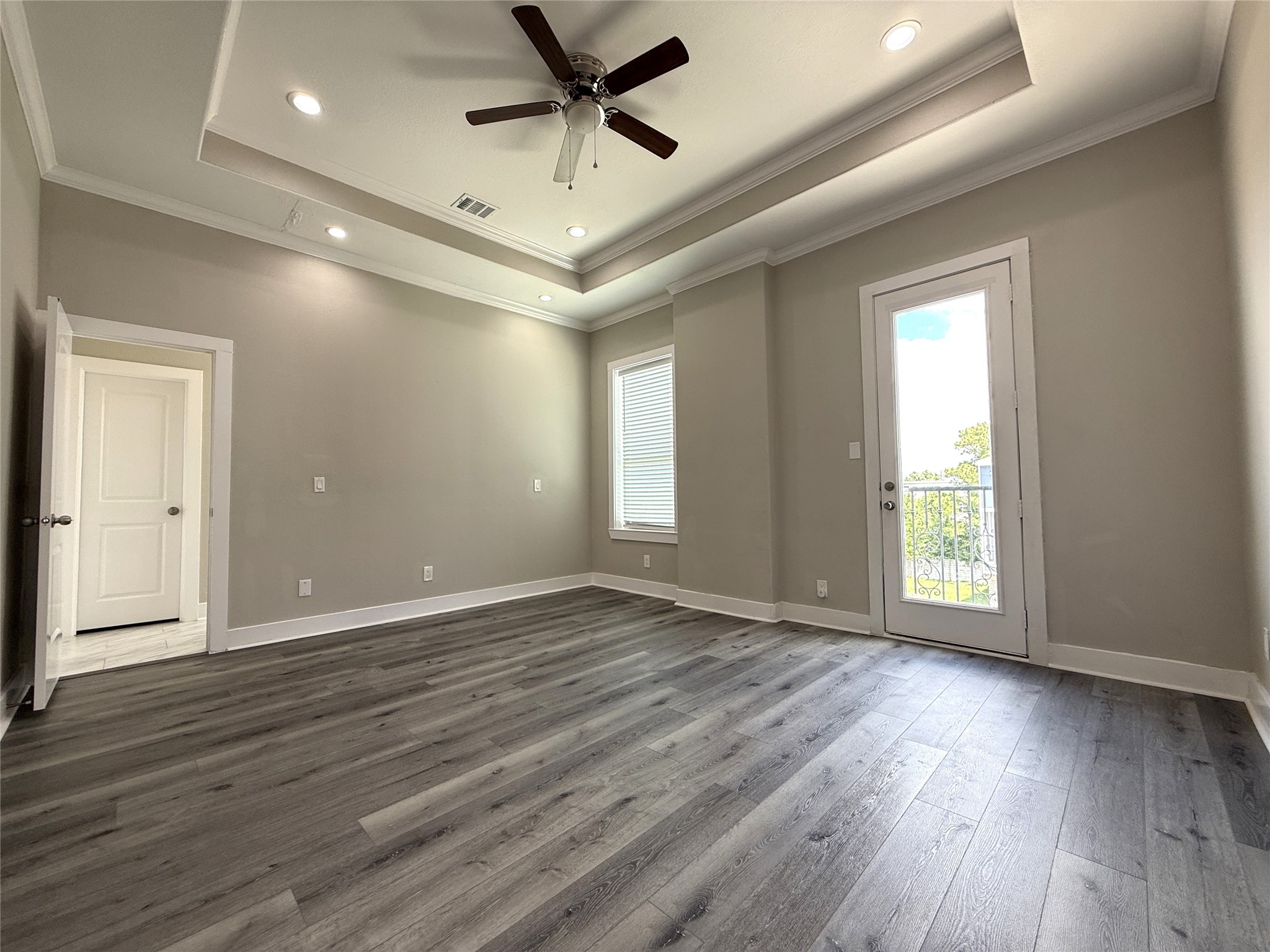 2123 Bidwell Drive Houston, TX 77018 - Photo 24 of 29 a view of an empty room with wooden floor and a window