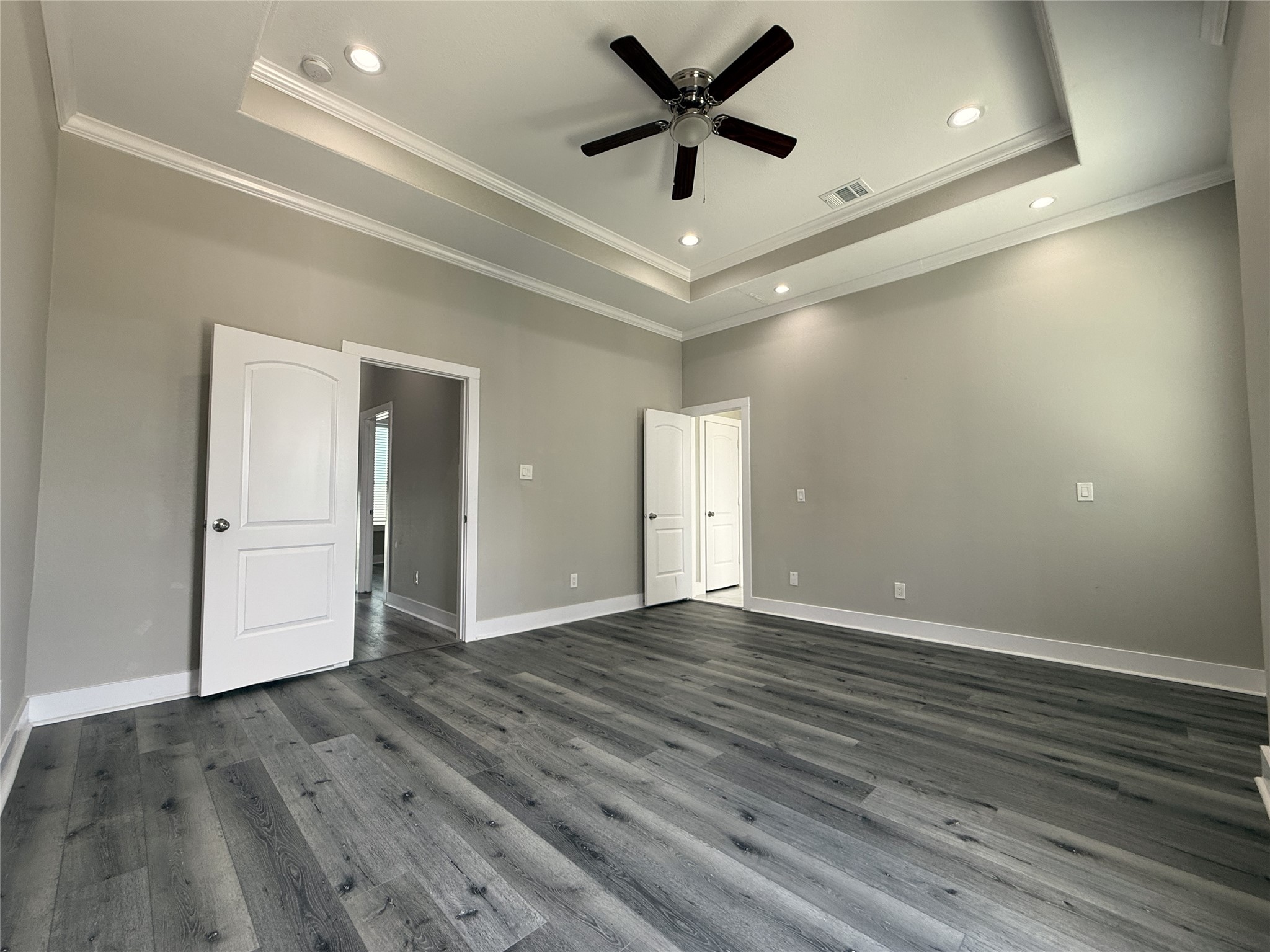 2123 Bidwell Drive Houston, TX 77018 - Photo 25 of 29 an empty room with wooden floor and a ceiling fan