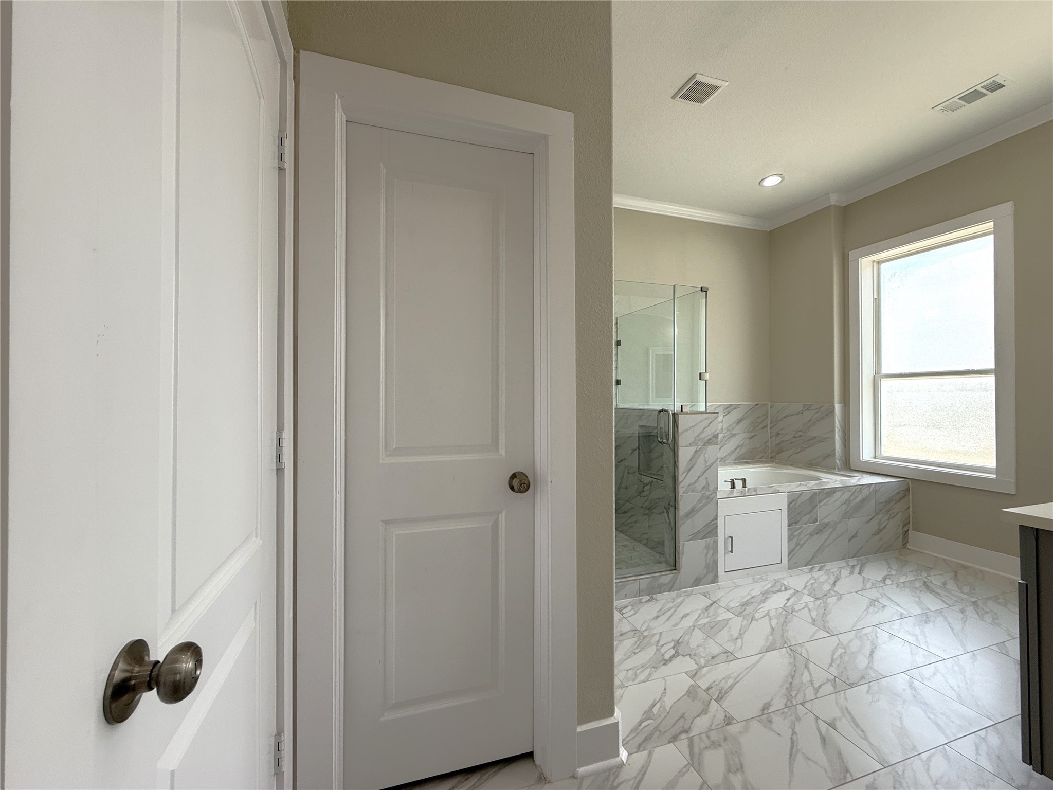 2123 Bidwell Drive Houston, TX 77018 - Photo 26 of 29 a bathroom with a bathtub and shower