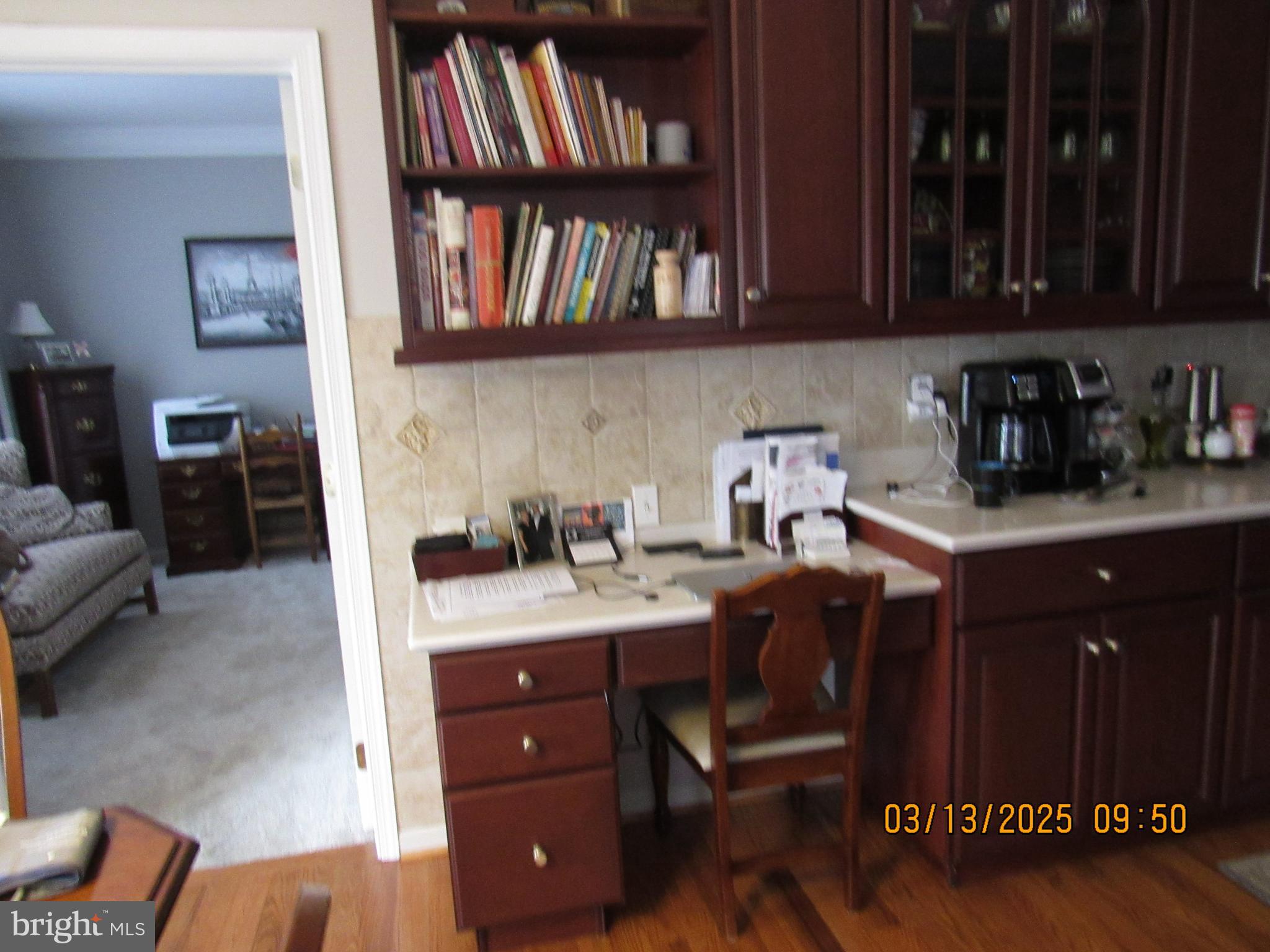 17 Lea Road New Castle, DE 19720 - Photo 6 of 17 a view of a workspace with furniture and a book shelf