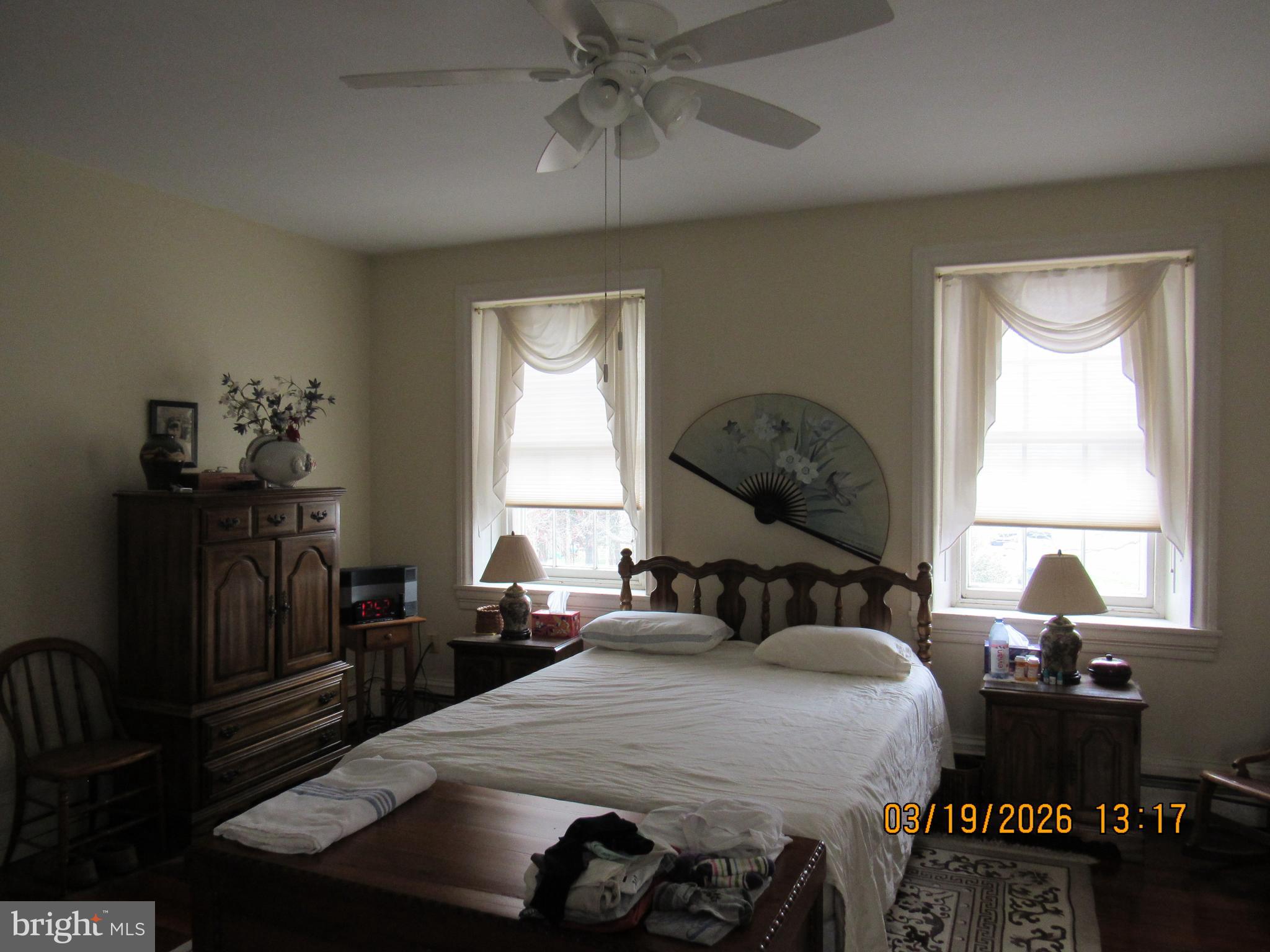17 Lea Road New Castle, DE 19720 - Photo 9 of 17 a bedroom with a bed and wooden floor