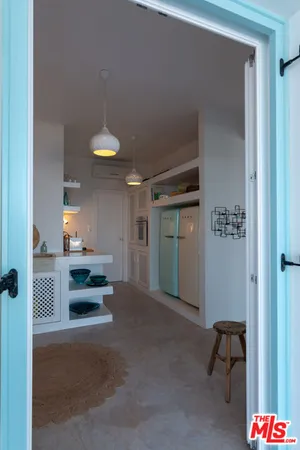 a view of room with furniture and a window