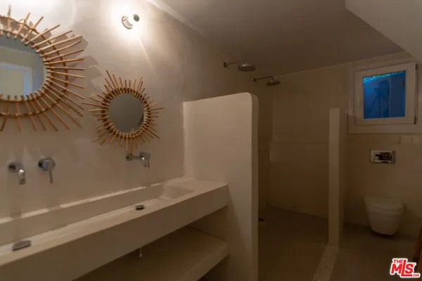 a view of bedroom and hallway