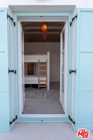 a bathroom with a shower and toilet