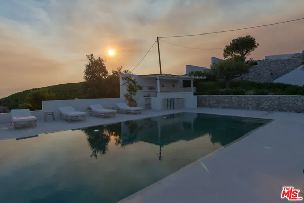 an aerial view of a house with a garden