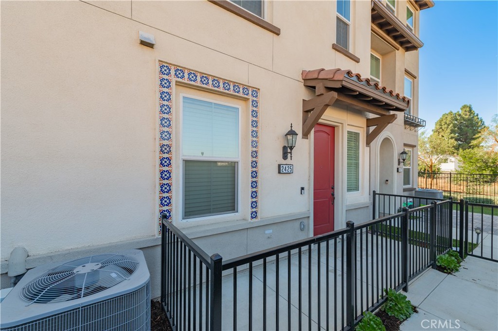2425 Villena Way Placentia, CA 92870 - Photo 2 of 35 a view of a house with a small yard and wooden floor and fence