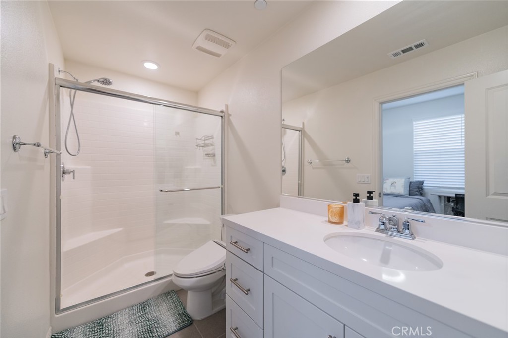2425 Villena Way Placentia, CA 92870 - Photo 21 of 35 a bathroom with a sink toilet and shower
