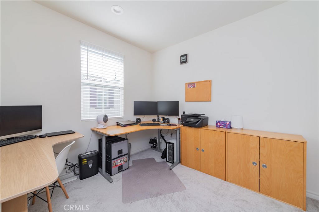 2425 Villena Way Placentia, CA 92870 - Photo 27 of 35 a view of a workspace with furniture and a window