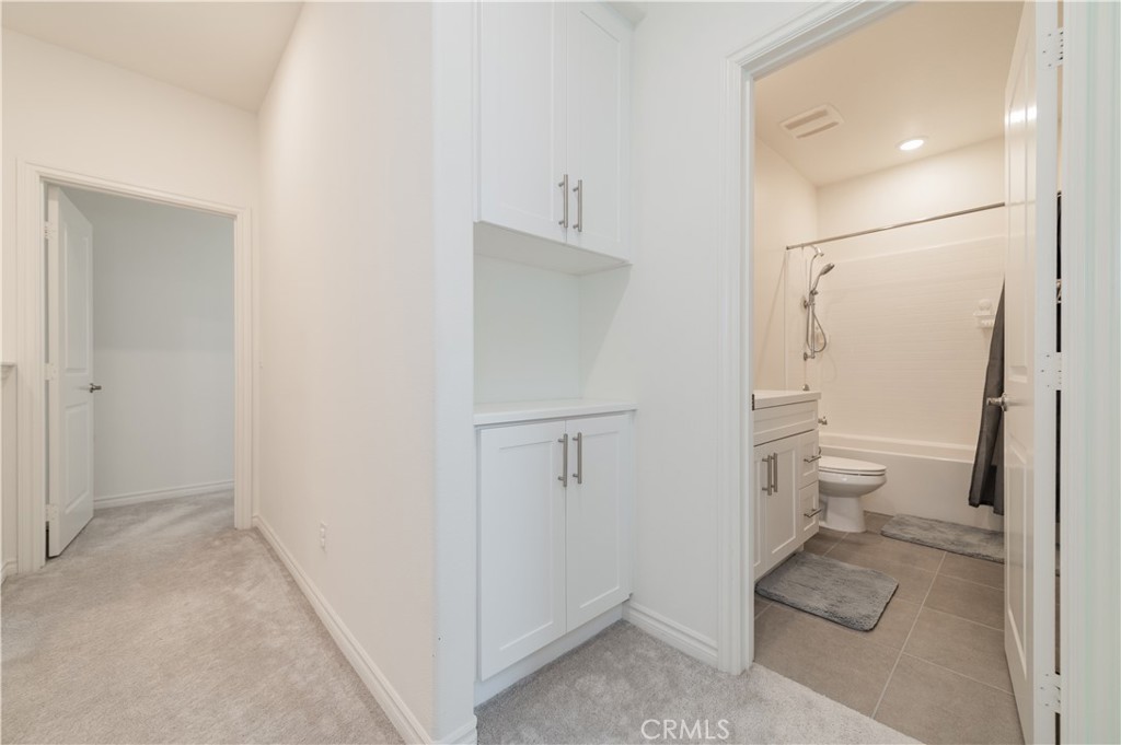 2425 Villena Way Placentia, CA 92870 - Photo 28 of 35 a bathroom with a sink and toilet