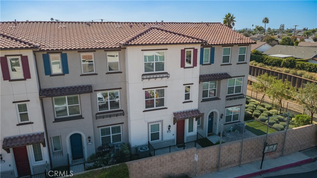 2425 Villena Way Placentia, CA 92870 - Photo 3 of 35 a front view of a house with a garden
