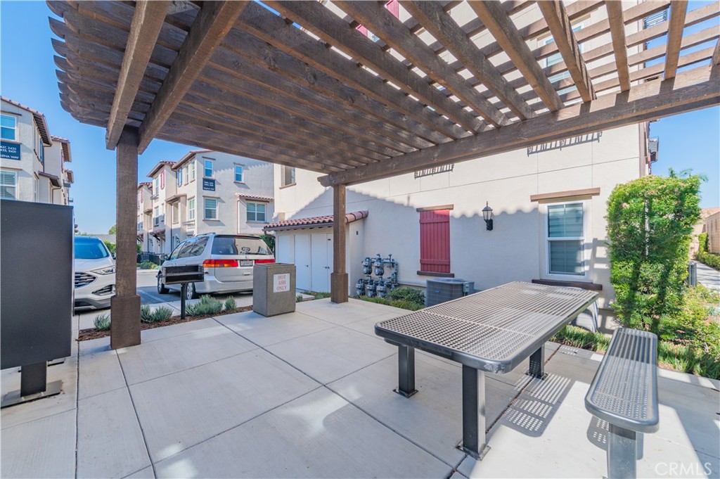 2425 Villena Way Placentia, CA 92870 - Photo 34 of 35 a view of a chairs and table in a patio