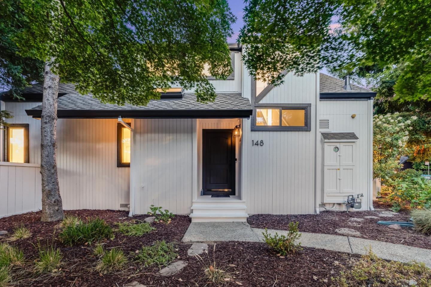 148 Promethean Way Mountain View, CA 94043 - Photo 1 of 45 a front view of a house with a yard