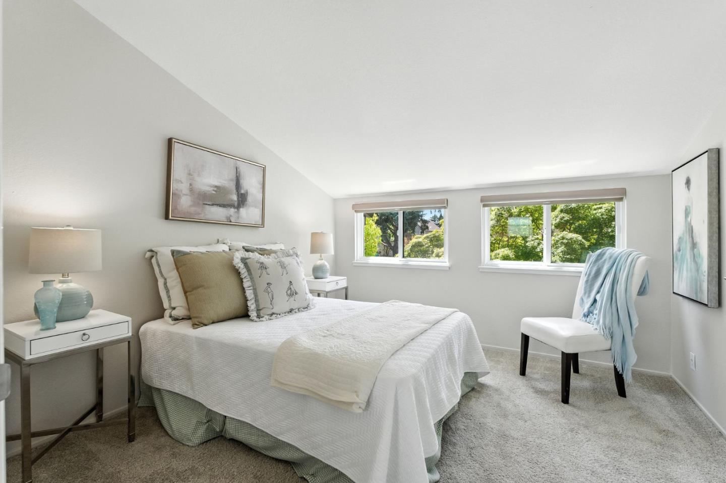 148 Promethean Way Mountain View, CA 94043 - Photo 16 of 45 a bedroom with a bed a painting and a window