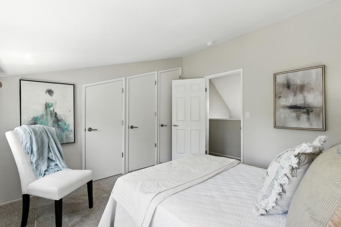 148 Promethean Way Mountain View, CA 94043 - Photo 17 of 45 a bedroom with a bed and a chair
