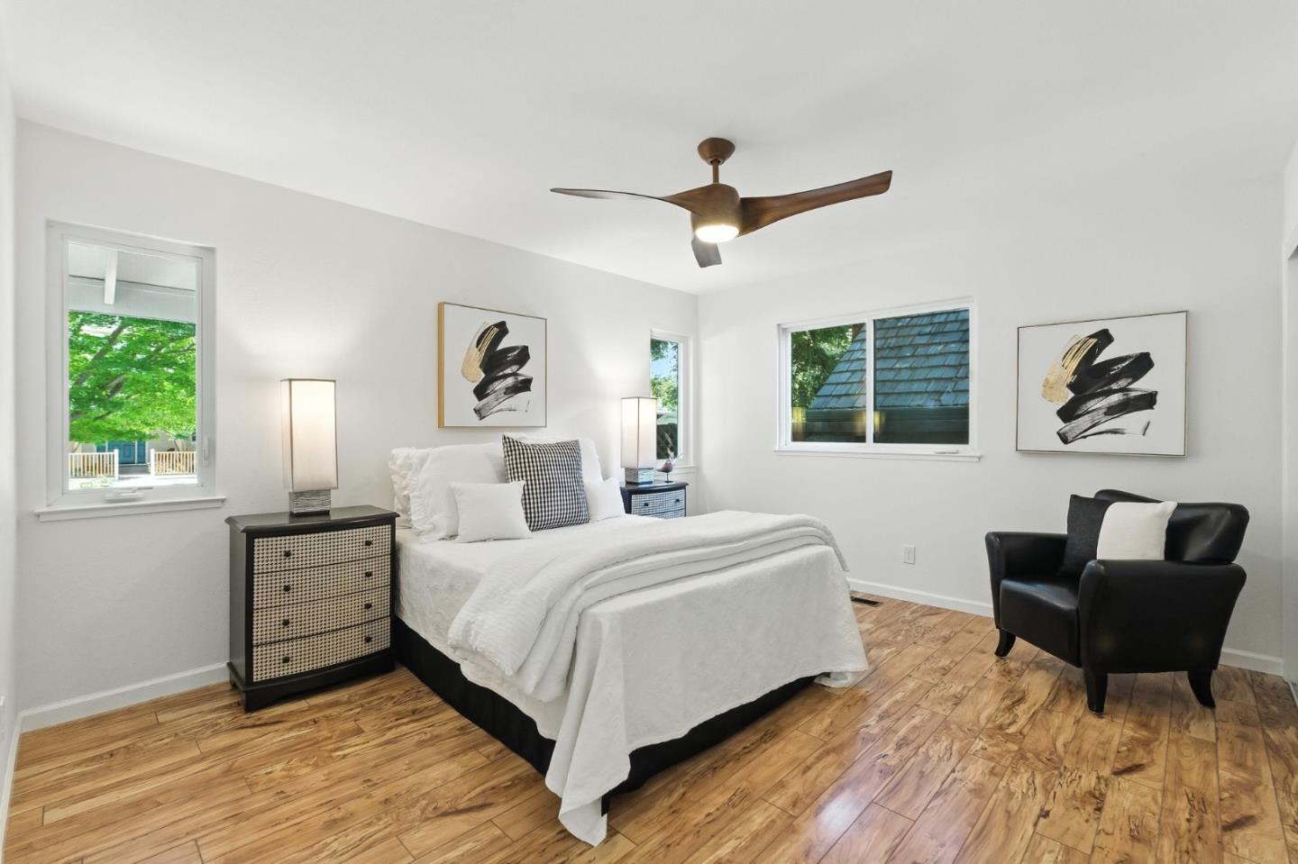 148 Promethean Way Mountain View, CA 94043 - Photo 19 of 45 a bedroom with a bed and wooden floor